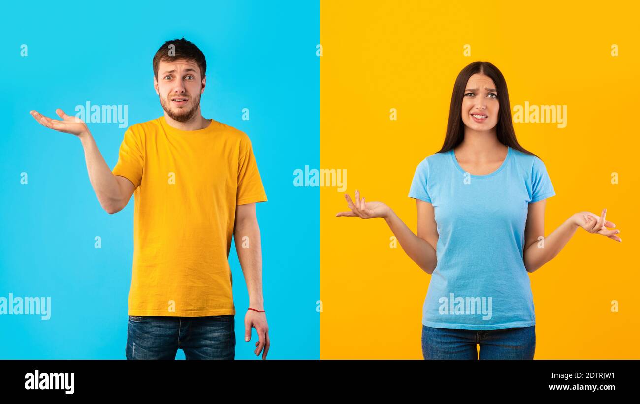 Confuso perplesso giovane coppia che si infrangono in studio Foto Stock