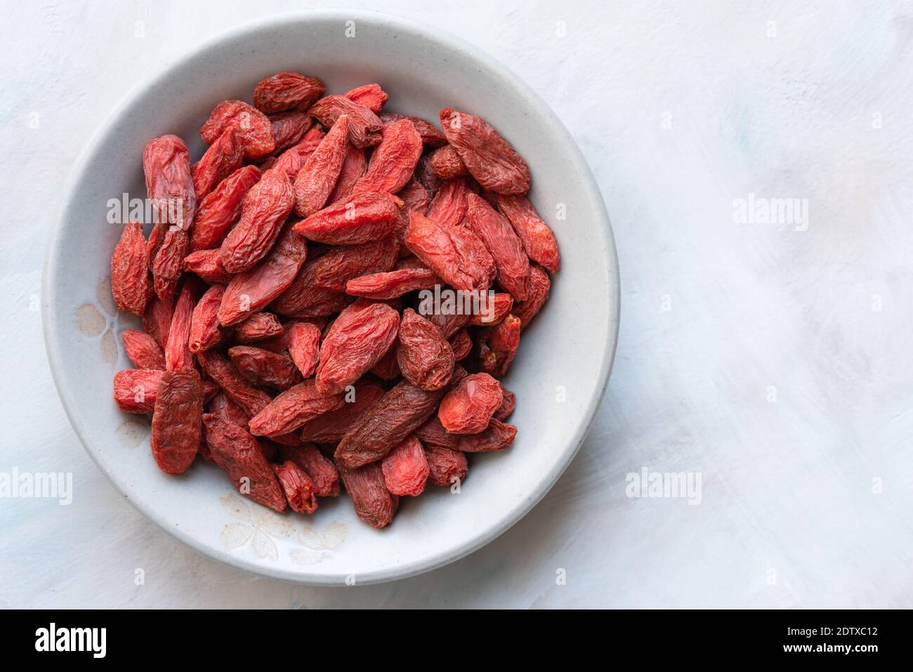Berries di Goji essiccate in una ciotola Foto Stock