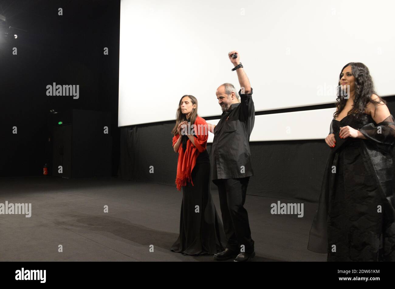 L-R : i registi Wiam Simav Bedirxan, Ossama Mohammed e Noma Omran hanno visto prima della proiezione del loro film 'Silvered Water, Siria Self-Ritratto', il terzo giorno del 67a Festival del Cinema a Cannes, in Francia, il 16 maggio 2014. Wiam Simav Bedirxan è appena arrivato da Homs in Siria, ed è stato mosso dalla reazione pubblica e applausi per ricevere lei e il suo film. Foto di Ammar Abd Rabbo//ABACAPRESS.COM Foto Stock