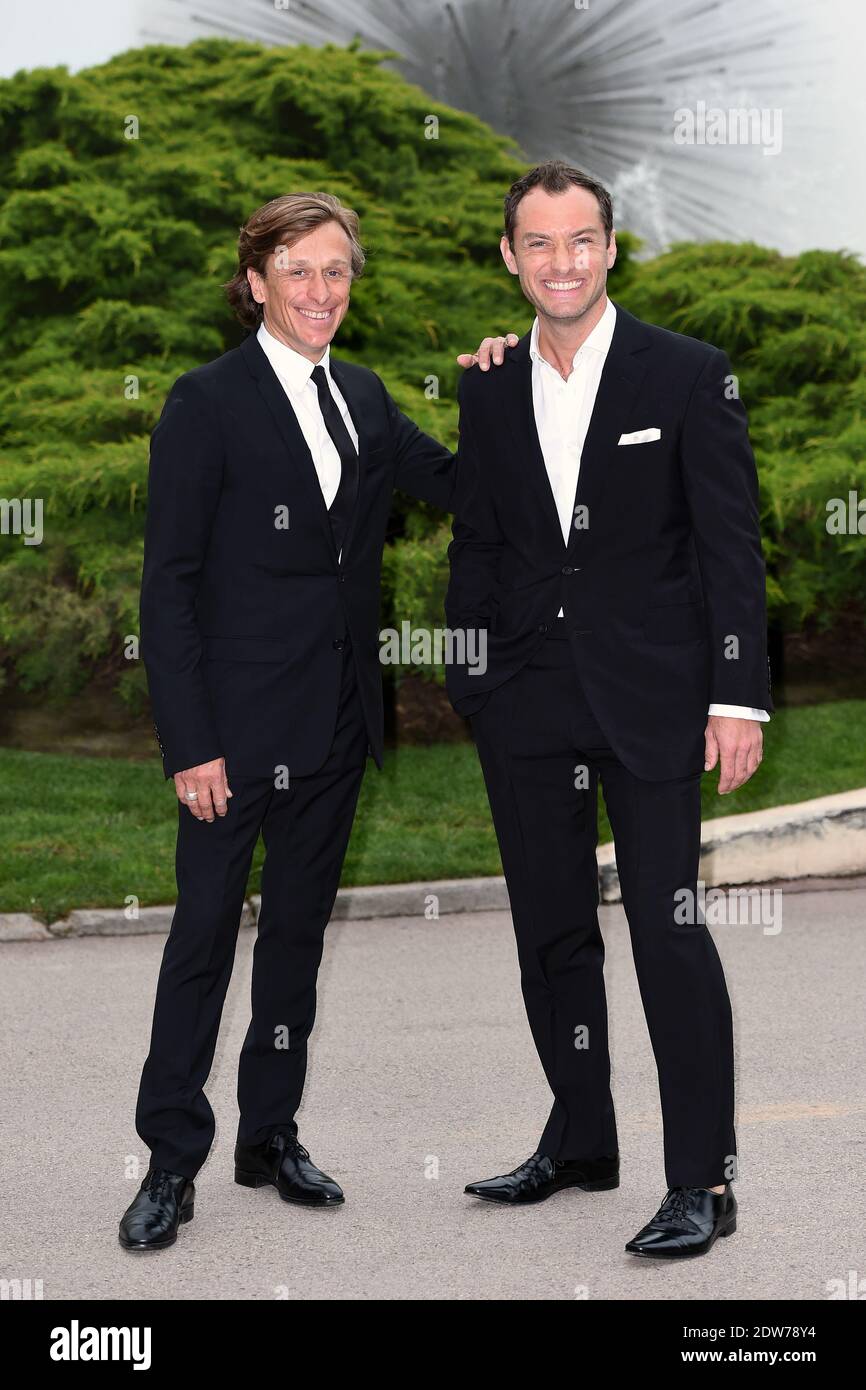 Jeremy Gilley, fondatore dell'organizzazione no-profit 'Peace One Day' e Jude Law, partecipa al 'Peace One Day Monaco Gala' tenutosi nella Salle des Etoiles allo Sporting Monte-Carlo di Monte-Carlo, Monaco, il 22 maggio 2014. L’evento benefico è a favore del lavoro educativo di un giorno per la Pace nella Repubblica Democratica del Congo e nella regione dei grandi Laghi in Africa. Foto di Nicolas Gouhier/ABACAPRESS.COM Foto Stock