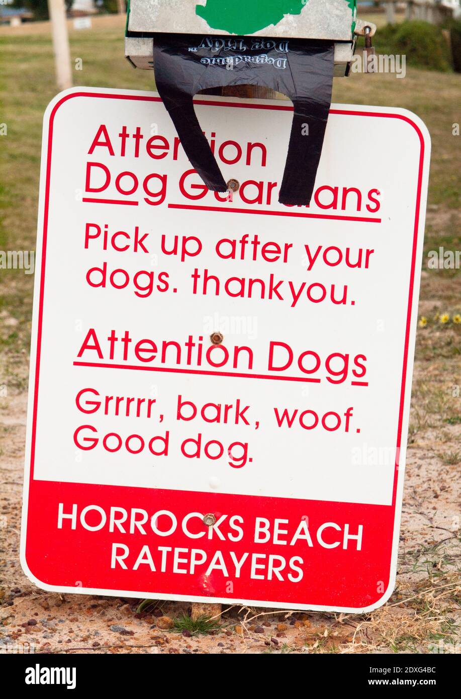 Segno whimsical diretto ai proprietari di cani, Horrocks Beach, Australia Occidentale Foto Stock