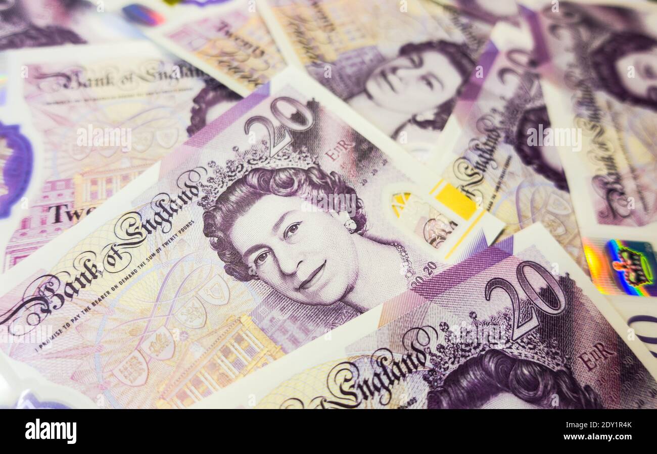 Inglese Sterling Polymer note attuali in tagli di venti Foto Stock
