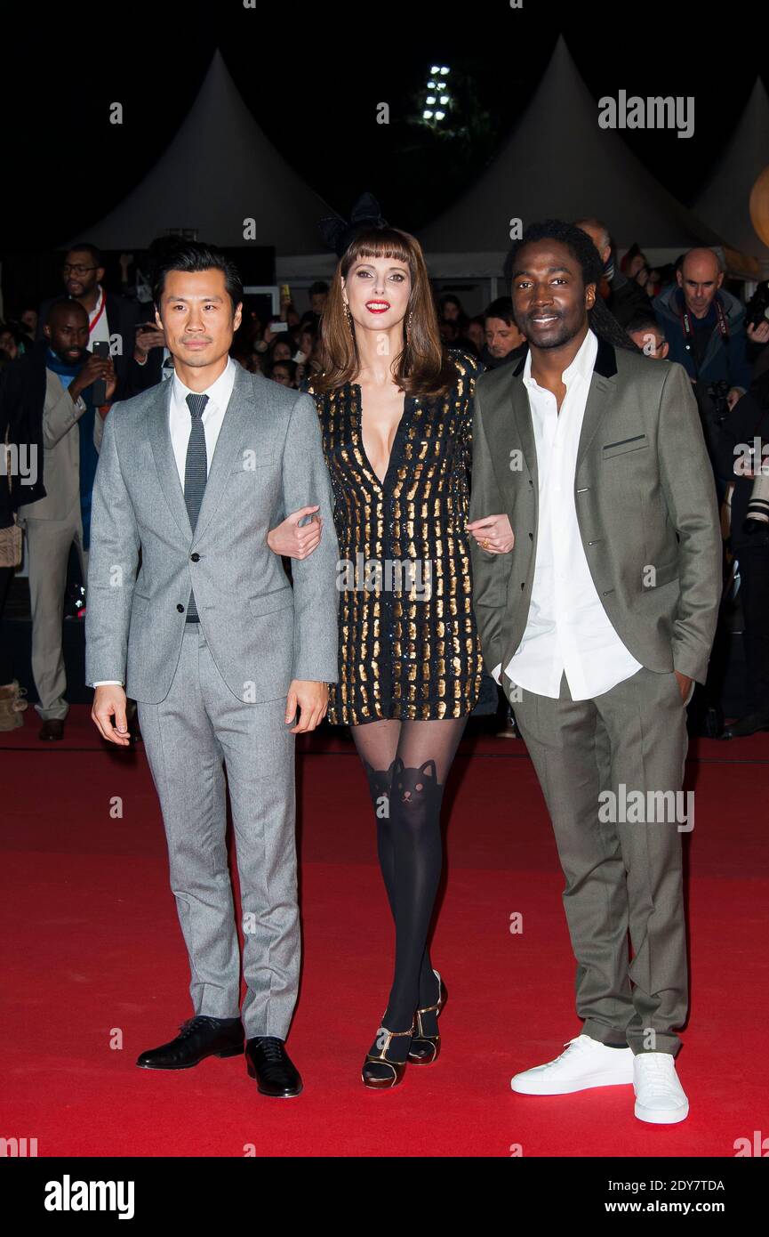 Frederique Bel, Noom Diawara, Medi Sadoun e Frederic Chau arrivano alla sedicesima cerimonia di premiazione della musica NRJ che si è tenuta il 13 dicembre 2014 al Palais des Festivals di Cannes, Francia. Foto di Nicolas Genin/ABACAPRESS.COM Foto Stock