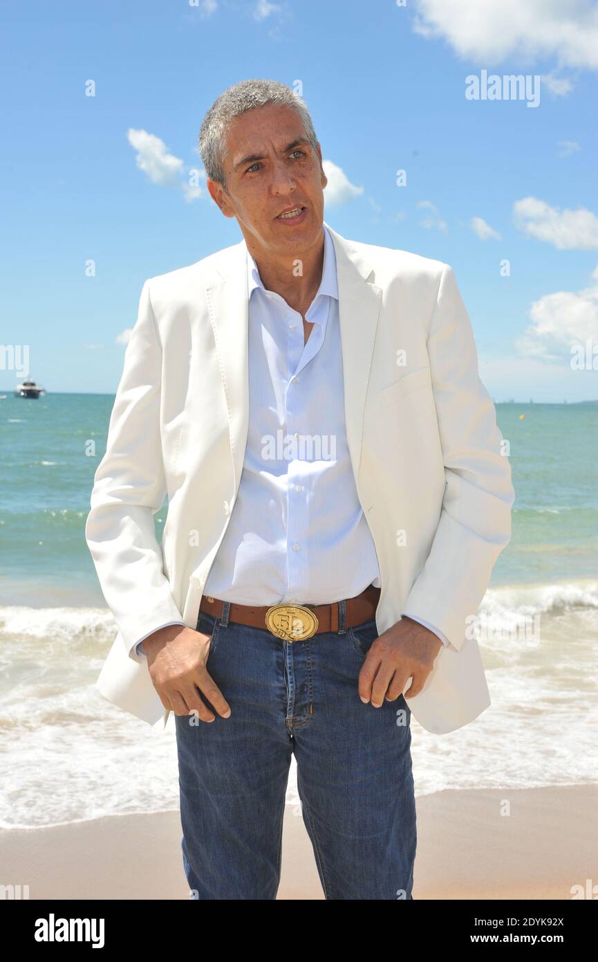 L'attore francese Samy Naceri alla fotocellula per il film "Tip Top" alla  Terrazza Martini di Cannes, nell'ambito del 66° festival cinematografico di  Cannes, in Francia, il 19 maggio 2013. Foto di Laurene