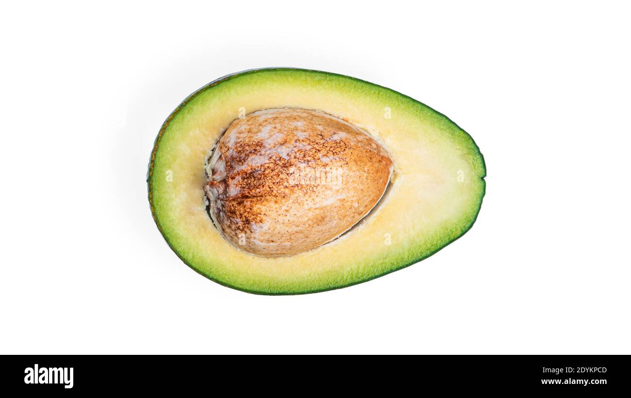 Avocado a metà su sfondo bianco. Foto di alta qualità Foto Stock