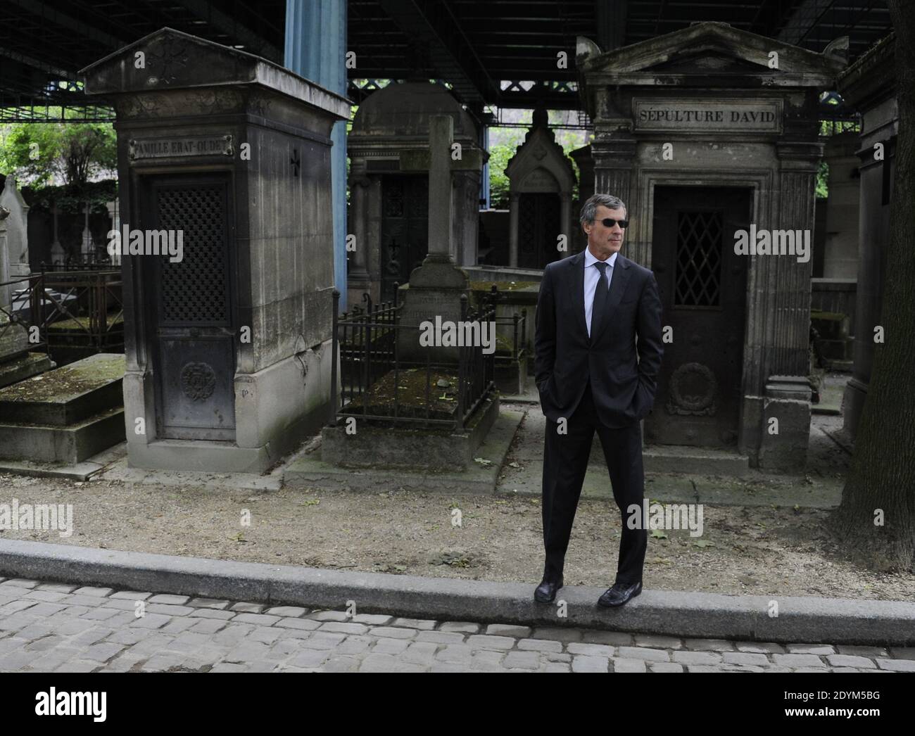 Jerome Cahuzac arriva al servizio funebre per Guy Carcassonne al cimitero di Montmartre a Parigi, Francia il 3 giugno 2013. Foto di Mousse-Wyters/ABACAPRESS.COM Foto Stock
