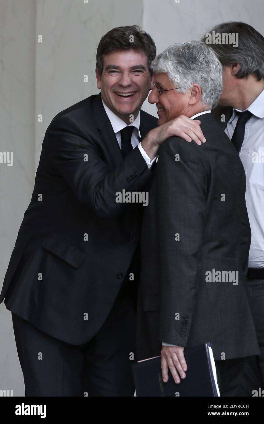 Il Ministro francese per la ripresa industriale Arnaud Montebourg, il Ministro per l'Ecologia, lo sviluppo sostenibile e l'energia, Philippe Martin e il Ministro dell'Agricoltura Stephane le foll lasciano il palazzo presidenziale Elysee dopo la riunione settimanale del gabinetto, a Parigi, in Francia, il 17 luglio 2013. Foto di Stephane Lemouton/ABACAPRESS.COM Foto Stock