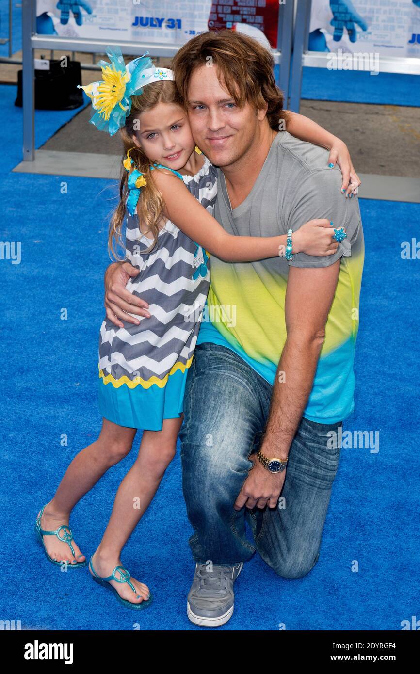 Larry Birkhead e Dannielynn Marshall partecipano alla prima di Los Angeles di "The Smurfs 2" al Regency Village Theatre di Los Angeles, CA, USA, il 28 luglio 2013. Foto di Lionel Hahn/ABACAPRESS.COM Foto Stock
