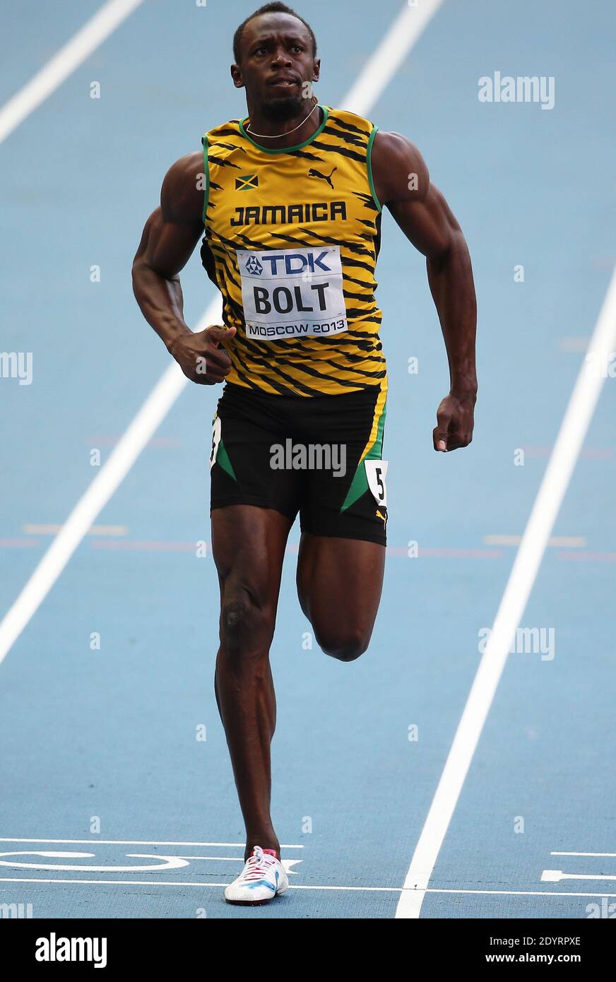 Usain Bolt of Jamaica (C) vince la finale di 100 metri davanti a Justin Gatlin (R) degli Stati Uniti in occasione del 14° Campionato Mondiale IAAF di Atletica allo stadio Luzhniki di Mosca, Russia, il 11 agosto 2013. A sinistra Giamaica Kemar Bailey-Cole. Foto di Giuliano Bevilacqua/ABACAPRESS.COM Foto Stock