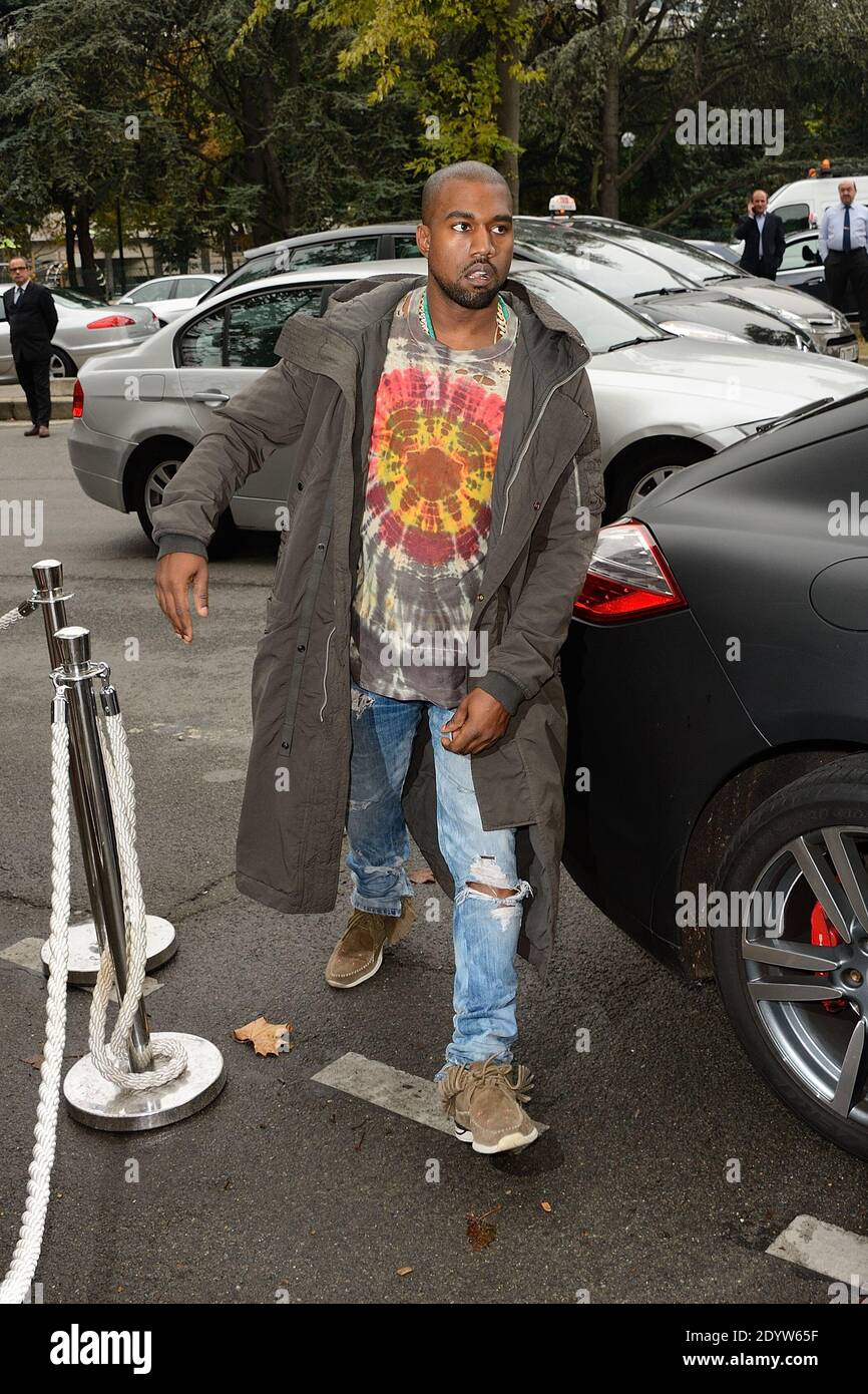 Kanye West partecipa alla mostra Primavera-Estate 2014 della collezione Ready-to-Wear di Celine, tenutasi al Tennis Club de Paris, Francia, il 29 settembre 2013. Foto di Nicolas Briquet/ABACAPRESS.COM Foto Stock