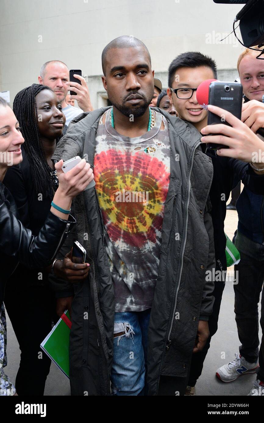 Kanye West partecipa alla mostra Primavera-Estate 2014 della collezione Ready-to-Wear di Celine, tenutasi al Tennis Club de Paris, Francia, il 29 settembre 2013. Foto di Nicolas Briquet/ABACAPRESS.COM Foto Stock