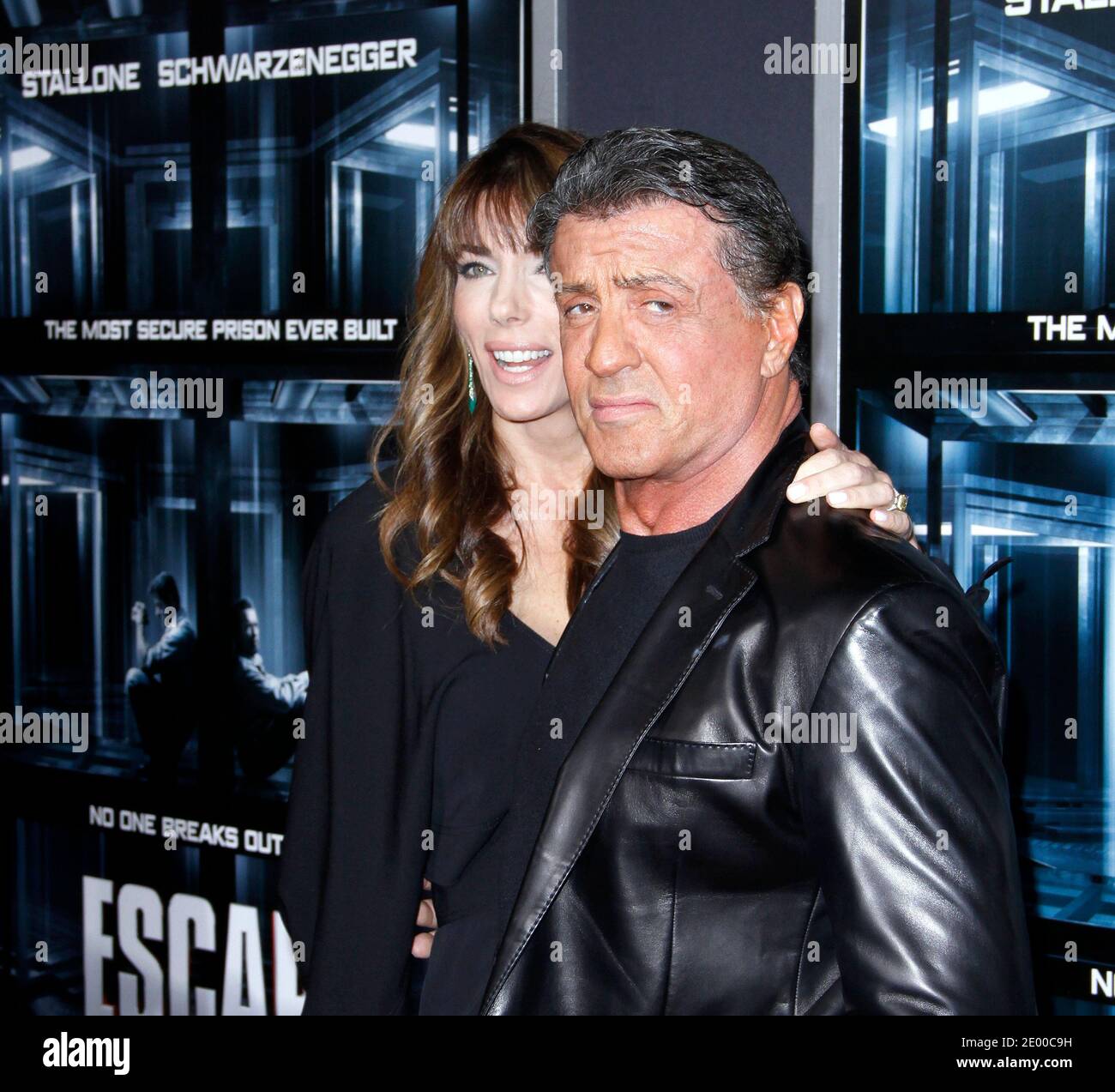 Jennifer Flavin e Sylvester Stallone partecipano alla proiezione 'Escape Plan' al Regal Theatre sulla 42nd Street a New York City, NY, USA il 15 ottobre 2013. Foto di Donna Ward/ABACAPRESS.COM Foto Stock