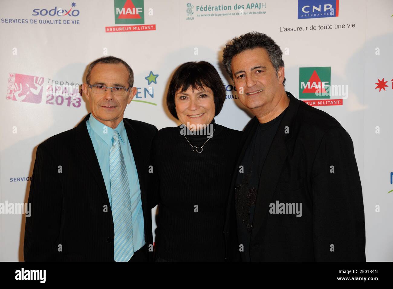 Jean-Louis Garcia, Ministro junior per i disabili Marie-Arlette-Carlotti, Phil Barney alla cerimonia di premiazione di Les Trophees APAJH 2013 tenutasi a Carrousel du Louvre a Parigi, Francia, il 9 dicembre 2013. Foto di Alban Wyters/ABACAPRESS.COM Foto Stock