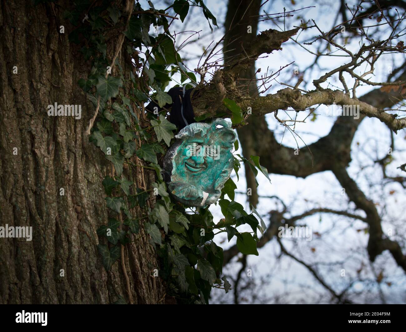 Immagine uomo verde in un albero di quercia a Silchester o Calleva Atrebatum città romana. Regno Unito. Foto Stock
