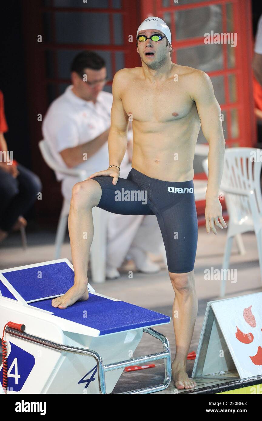 Clement Lefert compete sulla semifinale da 100 metri per la farfalla maschile durante i campionati francesi di nuoto, a Dunkerque, nel nord della Francia, il 23 marzo 2012. Foto di Nicolas Gouhier/ABACAPRESS.COM Foto Stock