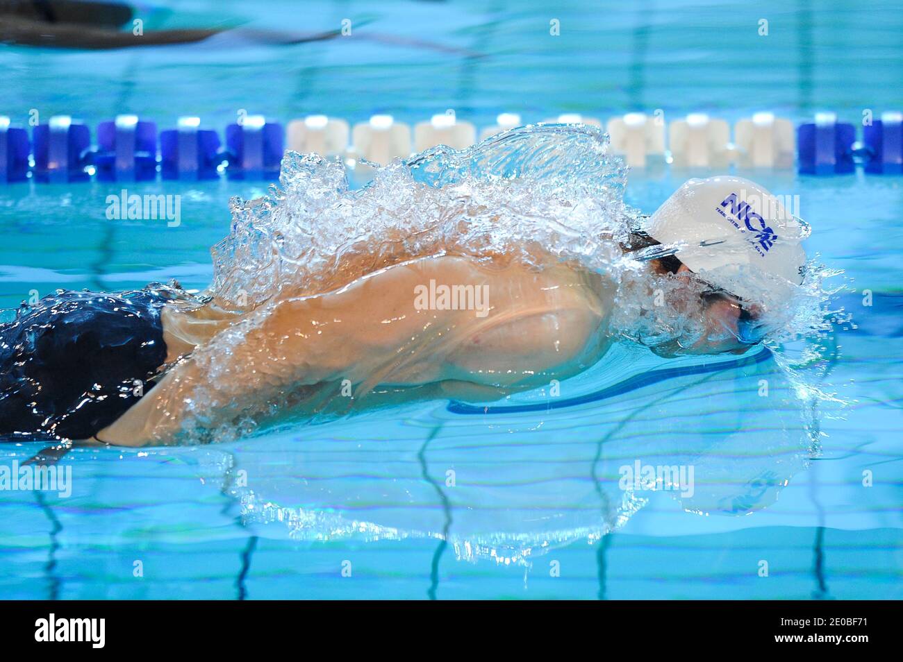 Clement Lefert compete sulla semifinale da 100 metri per la farfalla maschile durante i campionati francesi di nuoto, a Dunkerque, nel nord della Francia, il 23 marzo 2012. Foto di Nicolas Gouhier/ABACAPRESS.COM Foto Stock