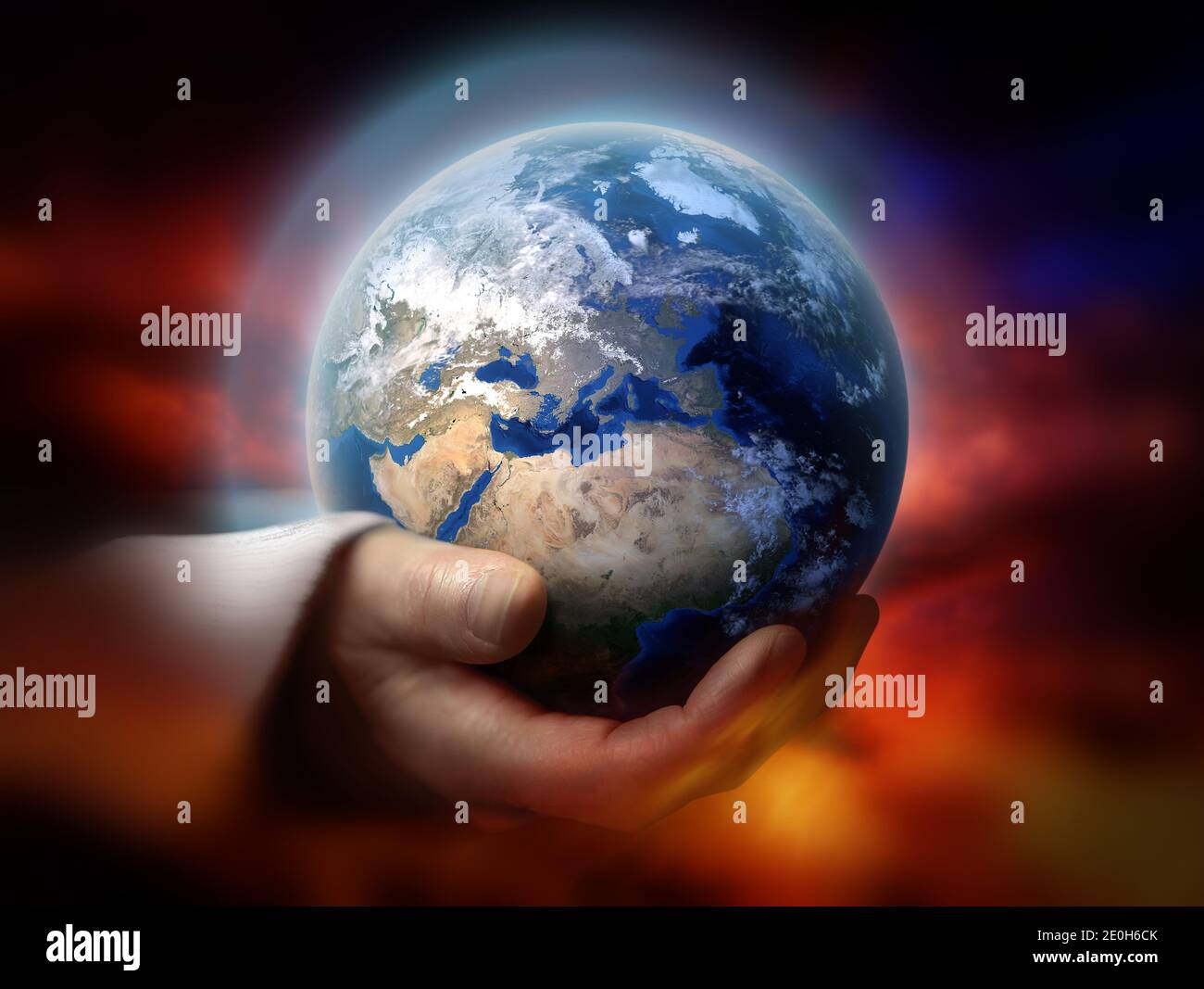 Dio che tiene il tema concettuale della terra Foto Stock