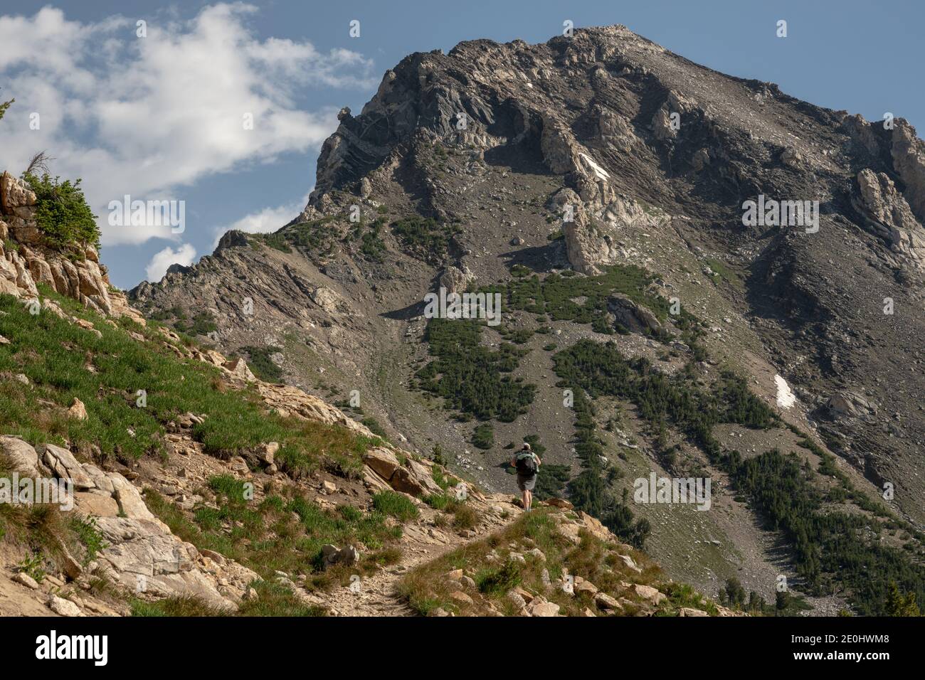 Escursionista Cimbing Up Paintbrush Canyon Trail a Grand Teton National Parcheggio Foto Stock