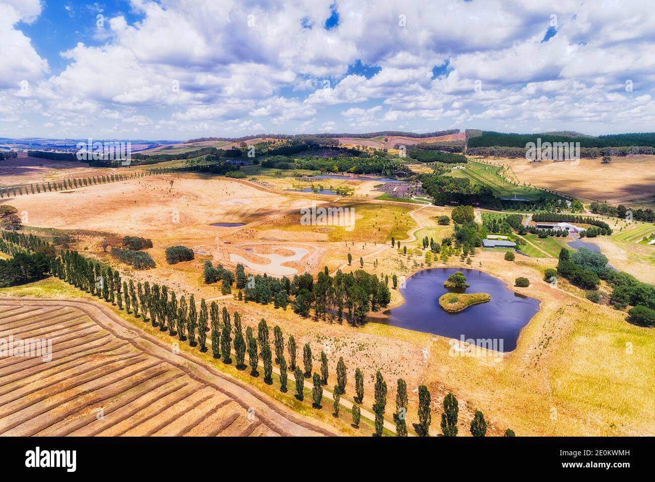 Terreni agricoli coltivati in agricoltura Terre centrali del NSW, Australia vicino Oberon Mayfield e Mayfield giardino parco locale. Foto Stock