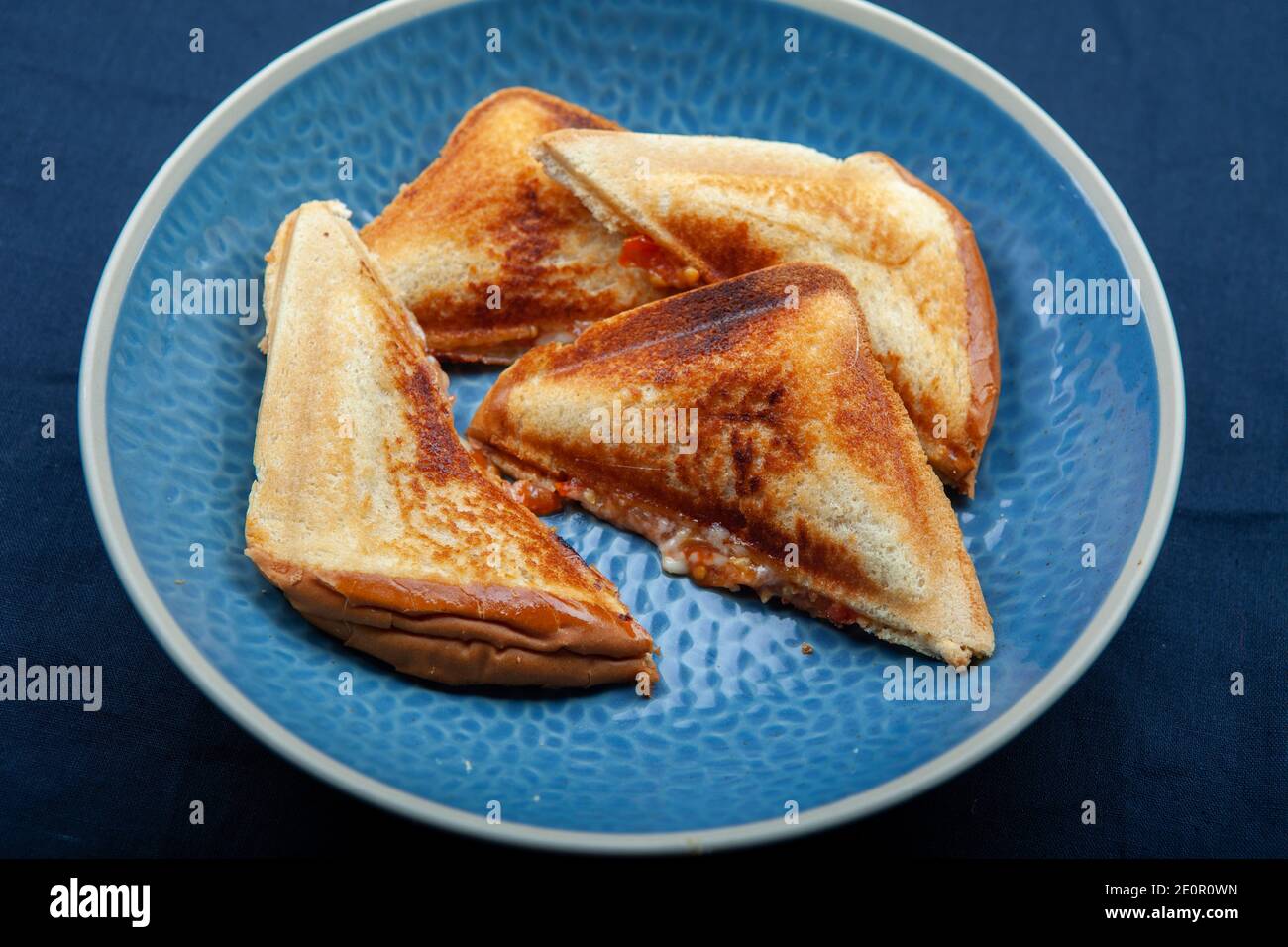 Panino tostato con formaggio e Tomatoe Foto Stock