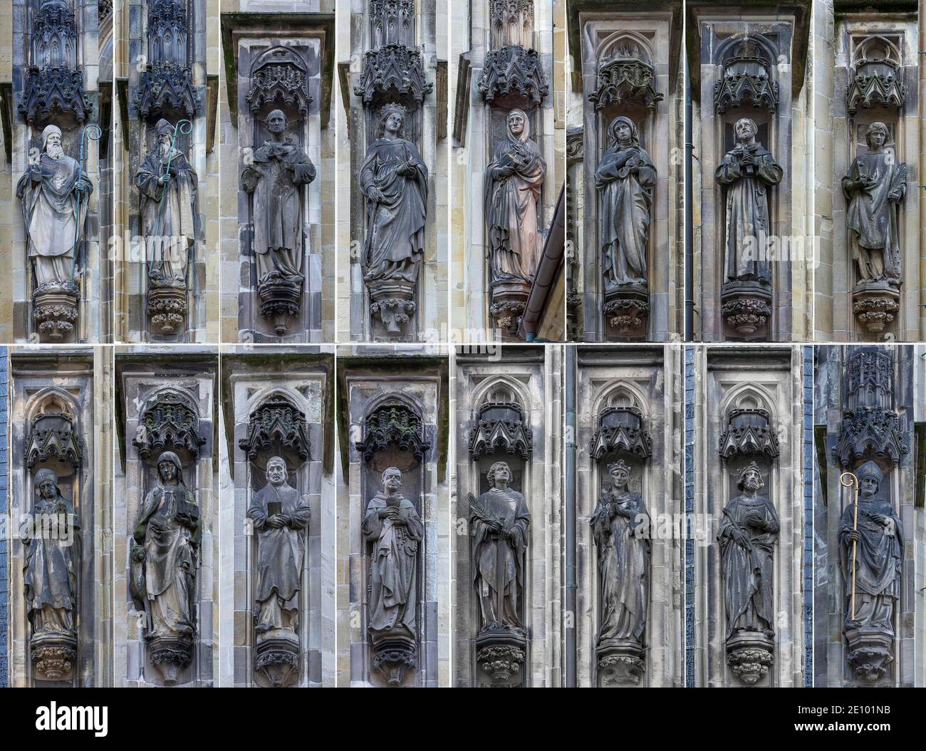 Sculture sacre e secolari sulla facciata della chiesa della Lambertikirche, Münster, Nord Reno-Westfalia, Germania, Europa Foto Stock