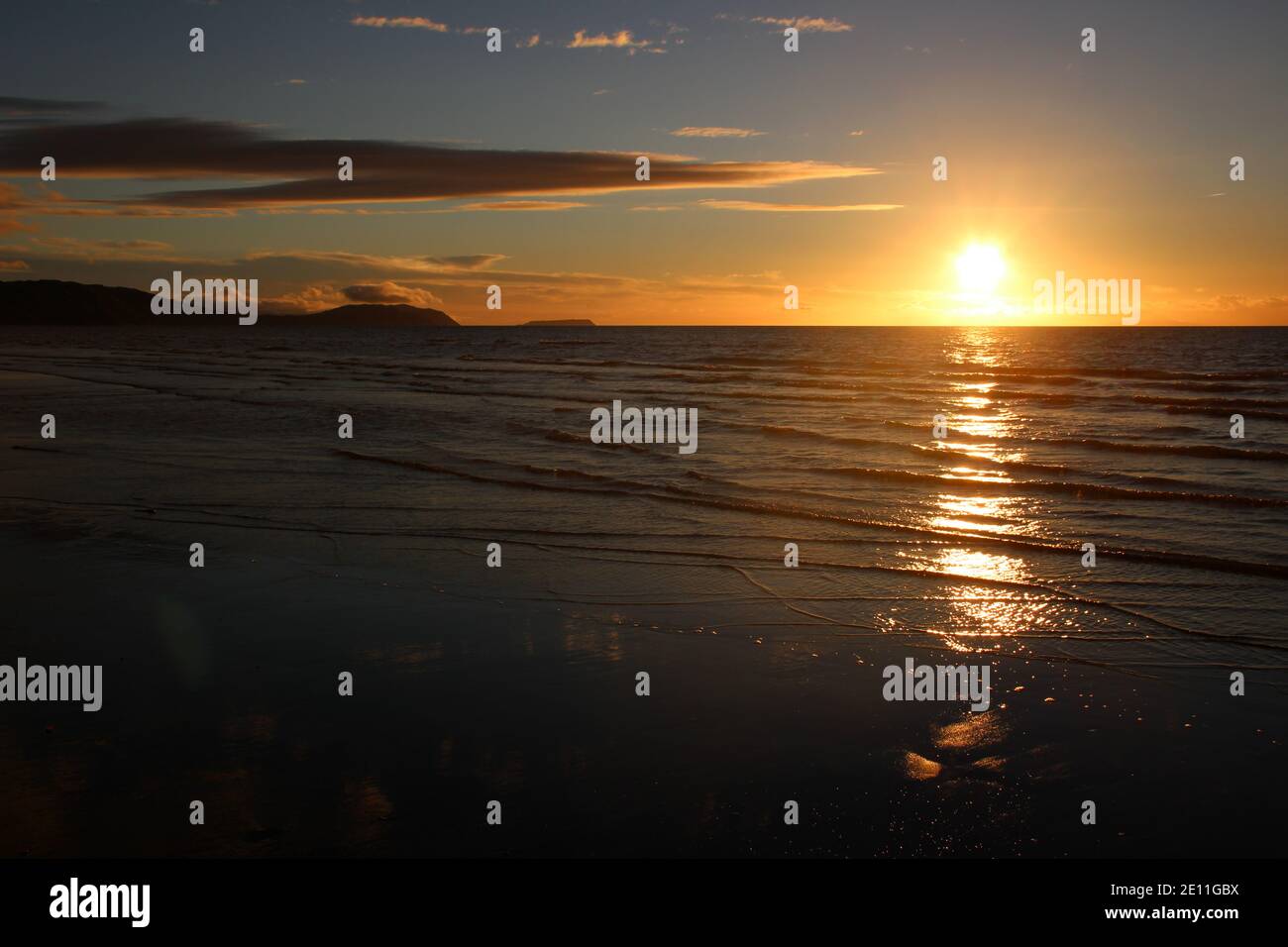 Tramonto paesaggio spiaggia a Kapiti, Nuova Zelanda Foto Stock