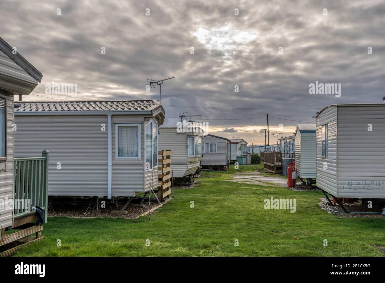 Un sito caravan a Norfolk fuori stagione in inverno. Foto Stock