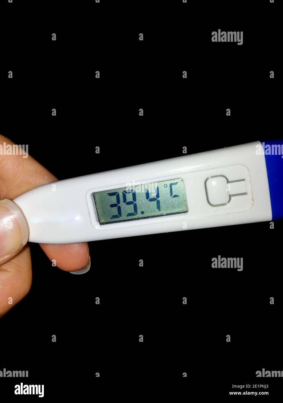 Termometro clinico che indica febbre alta - malato Foto stock - Alamy