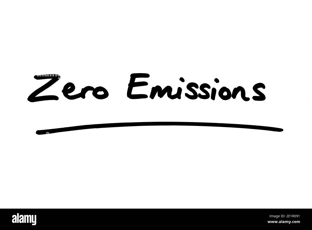 Emissioni zero scritte a mano su sfondo bianco. Foto Stock