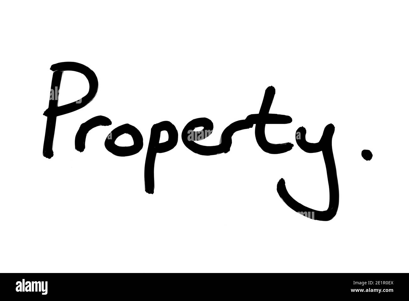 La parola proprietà scritta a mano su uno sfondo bianco. Foto Stock