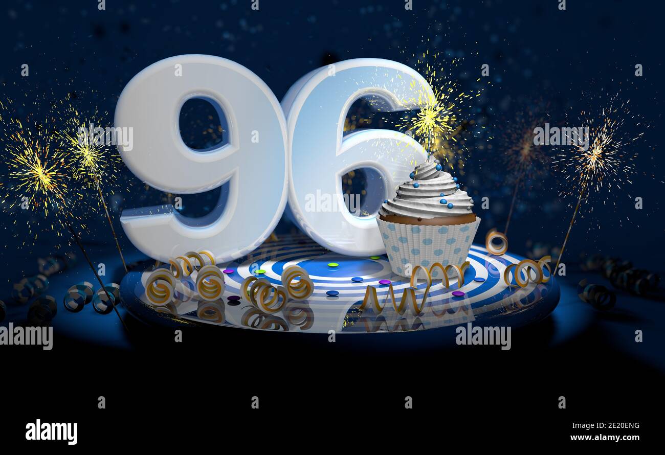 Cupcake con candela frizzante per il 96esimo compleanno o anniversario con grande numero in bianco con le fiamme gialle sul tavolo blu con sfondo scuro pieno Foto Stock