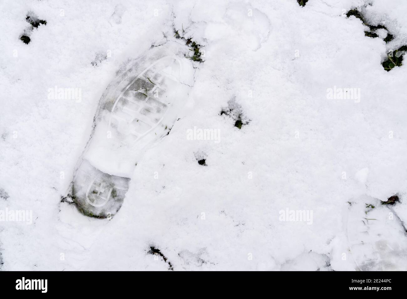 Dettagli footprint sulla neve con spazio per la copia Foto Stock