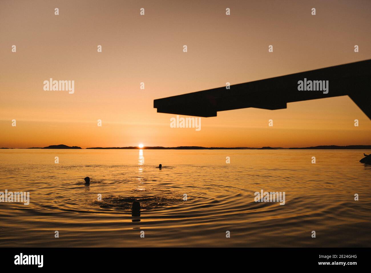 Silhouette di trampolino al tramonto Foto Stock