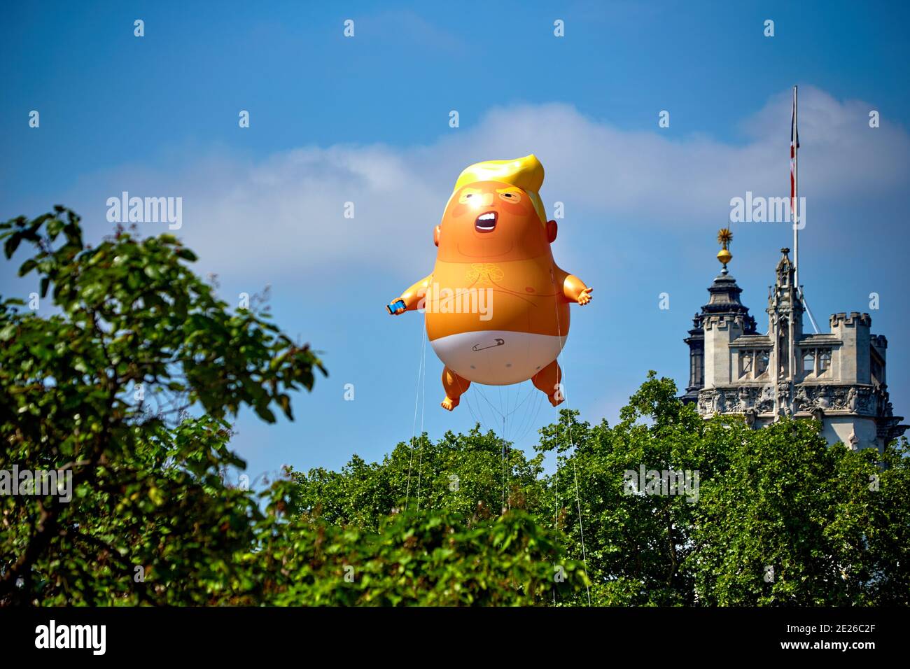 Trump Baby blimp vola in Piazza del Parlamento durante un funzionario Visita del Presidente degli Stati Uniti a Londra Foto Stock