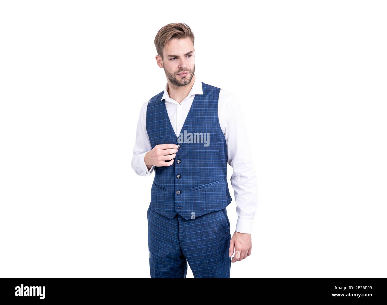 L'uomo è bello indossare abiti da uomo sartoriali in stile formale isolato su bianco, su misura. Foto Stock