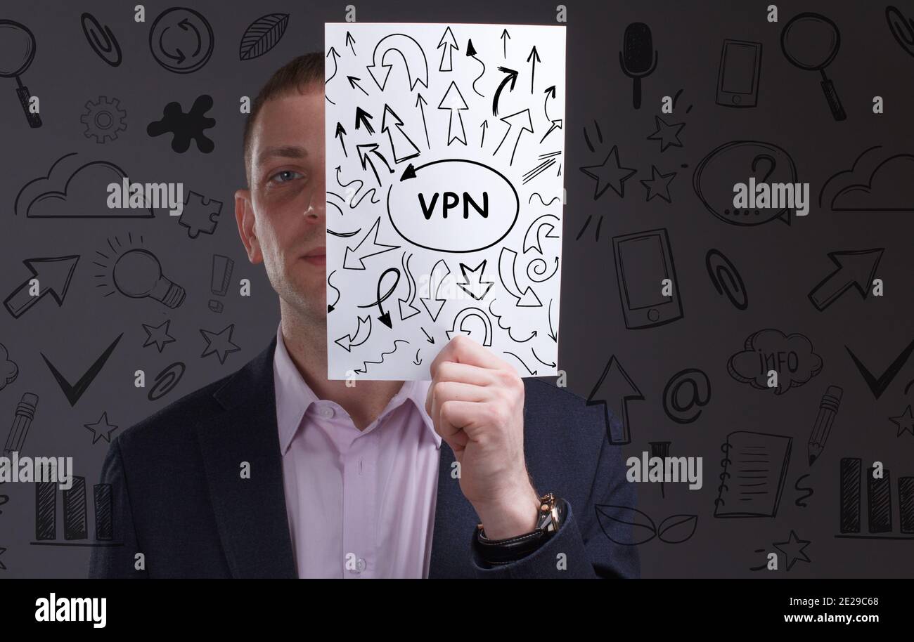 Business, tecnologia, Internet e concetto di rete. Giovane uomo d'affari che lavora su uno schermo virtuale del futuro e vede l'iscrizione: VPN Foto Stock