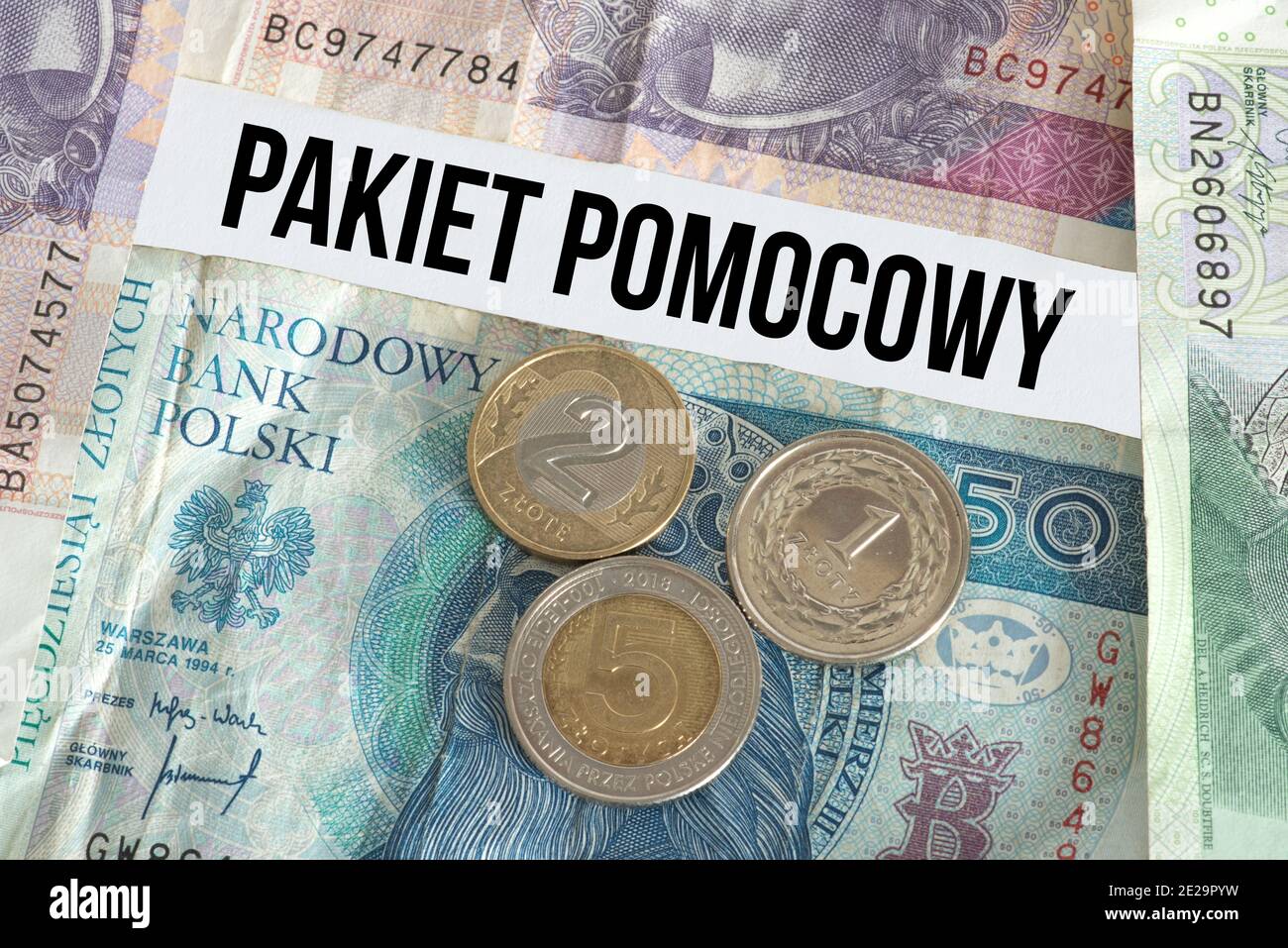 Denaro Polacco zloty PLN e pacchetto di aiuti per la Polonia Foto Stock