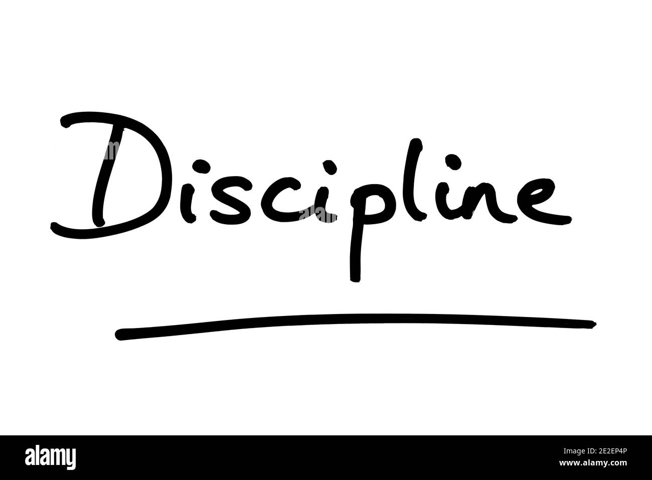 Disciplina, scritta a mano su sfondo bianco. Foto Stock