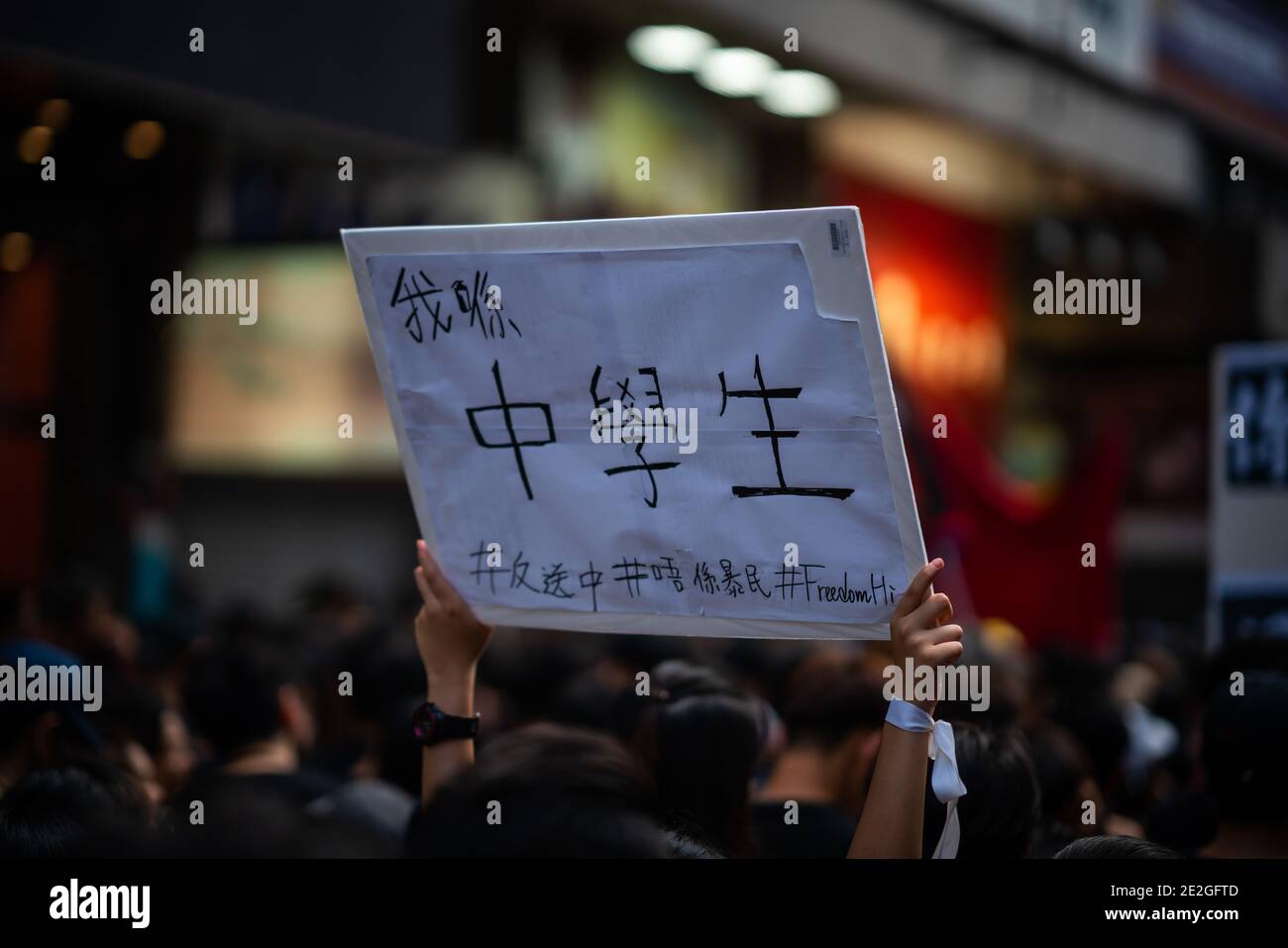 HONG KONG, CINA - 16 giugno 2019: HONG KONG - 16 GIUGNO 2019: Protesta contro l'estradizione a Hong Kong il 16 giugno 2019. Tenendo un poster di 'sono un sec Foto Stock