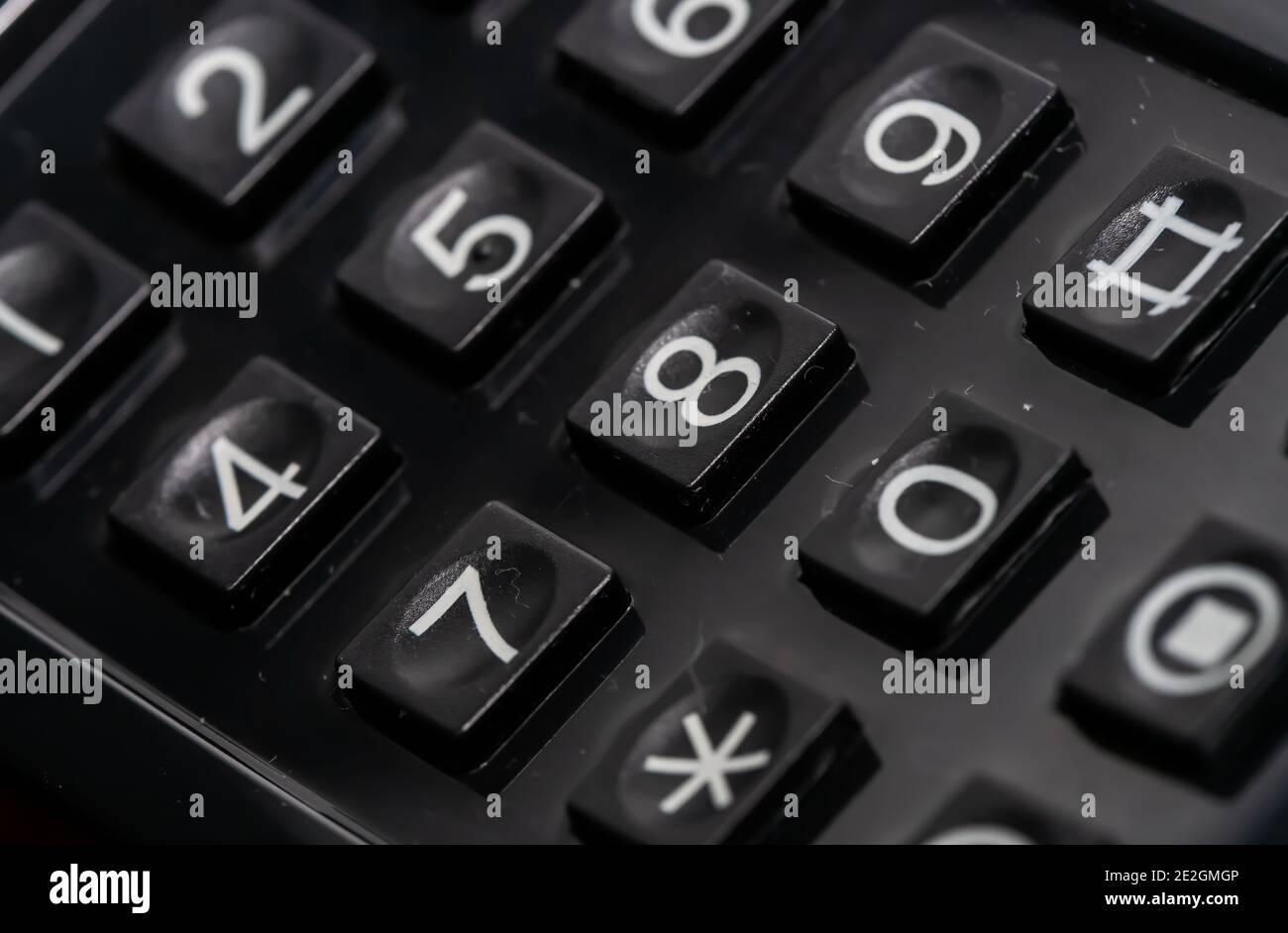 Primo piano dei tasti di selezione numerica su un vecchio telefono analogico. Foto Stock