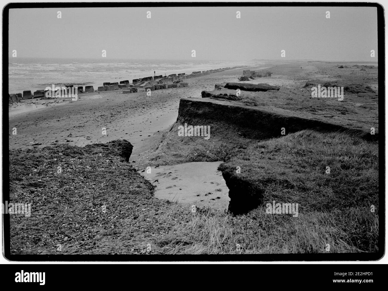 Erosione delle coste Humberside England UK 1994 la linea costiera in via di estinzione tra Skipsea e Easington su Humberside, che viene spazzata via a 1.7 metri l’anno dall’inizio dei record a metà degli anni ’50. Foto Stock