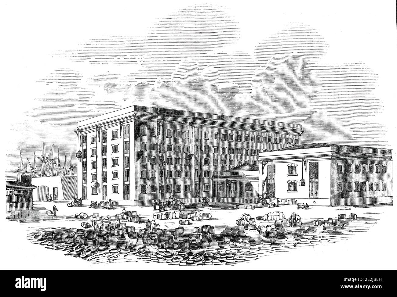 I nuovi magazzini del tè, London Docks, 1845. 'Il nuovo magazzino si trova al West Quay, sul lato nord-ovest dei Docks, e molto vicino all'entrata principale da East Smithfield, sul sito dell'ufficio e deposito bagagli del sovrintendente originale. È stato iniziato nel maggio 1844, e completato lo scorso luglio, al costo, si comprende, di & xa3;100,000. L'intero edificio e' a cinque piani di altezza, di undici piedi ciascuno, esclusivo della volta, ed e' molto più alto di qualsiasi dei magazzini del London Dock. Il principale, o magazzino del tè, è 290 piedi in lunghezza e 104 piedi in larghezza. T Foto Stock