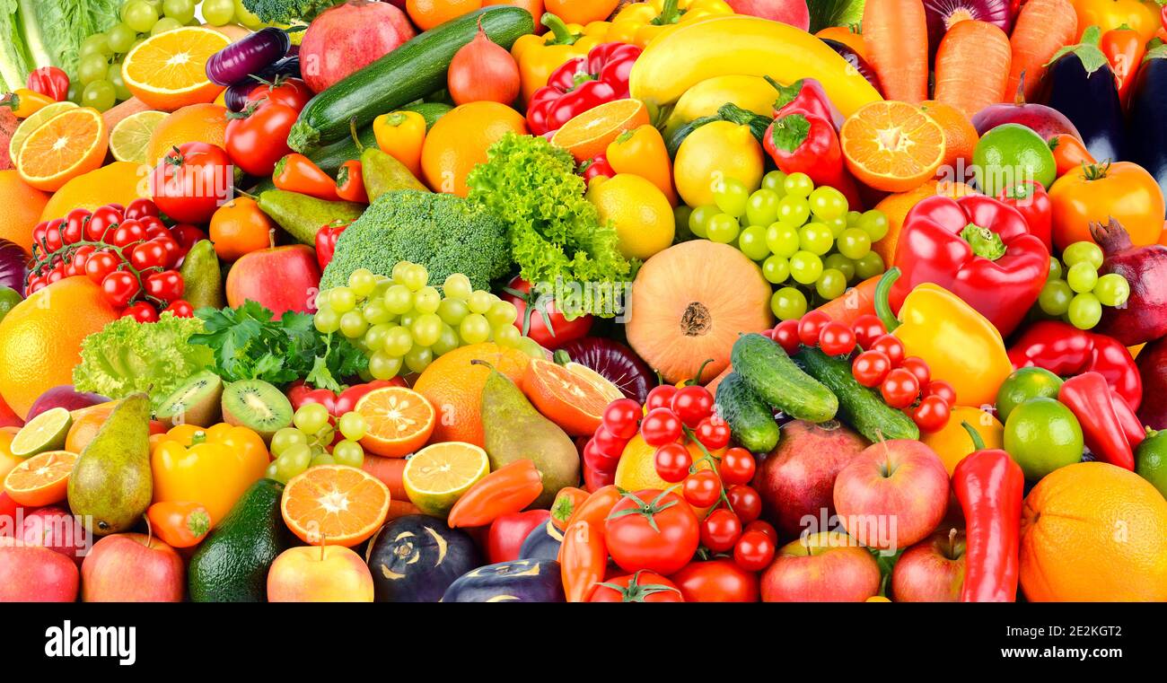 Ampio sfondo fatto di verdure e frutta. Concetto di cibo. Vista dall'alto Foto Stock