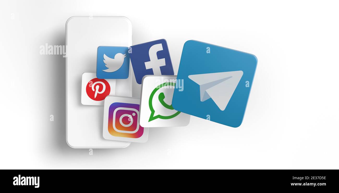 Telegramma vs. Concetto app. Vista dall'alto delle famose icone delle applicazioni social media in 3D su sfondo bianco e telefono cellulare. Foto Stock