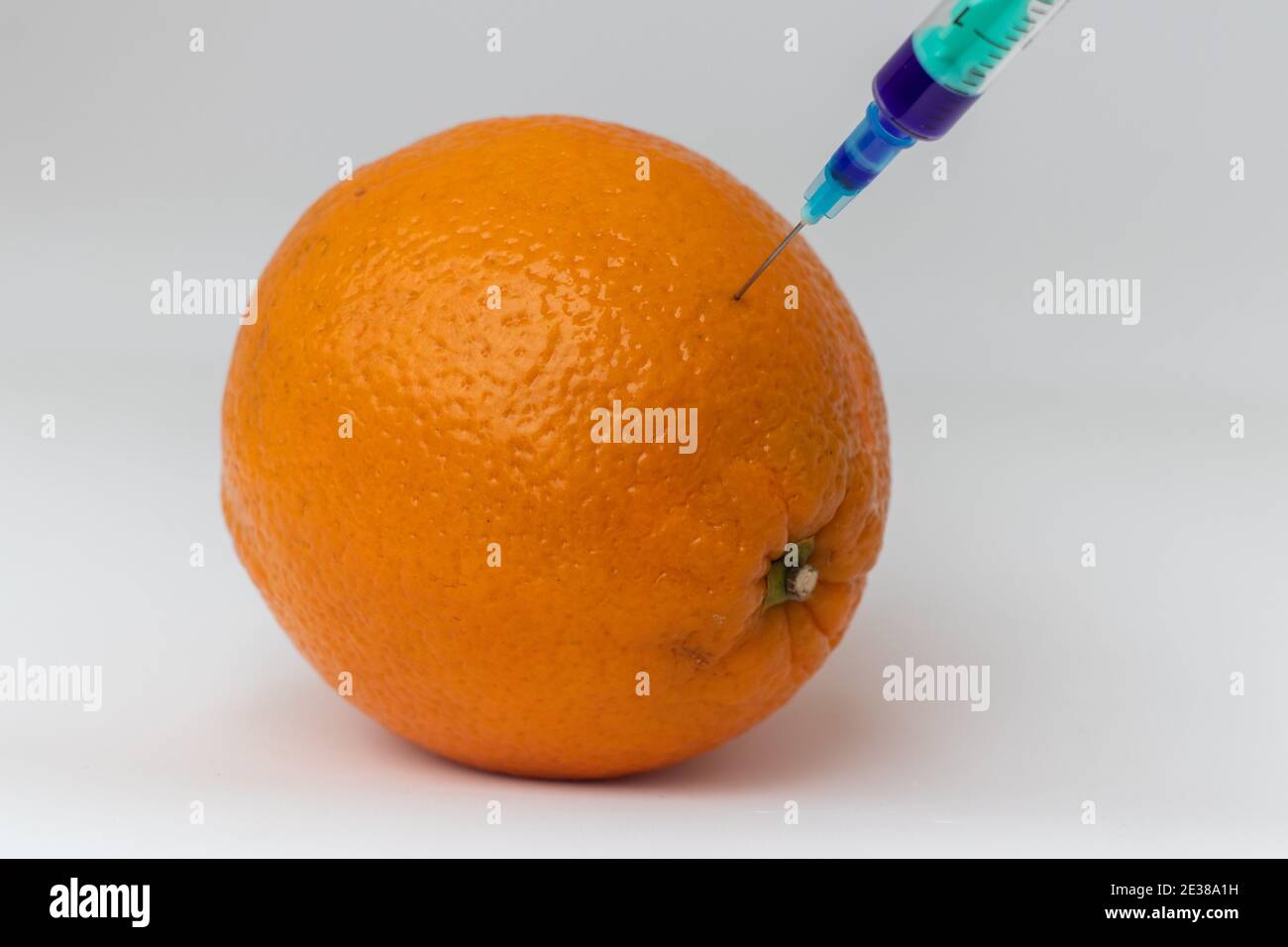 OGM. Sperimentare l'arancione. Alimenti bioingegneristici, prodotti geneticamente modificati. Foto Stock