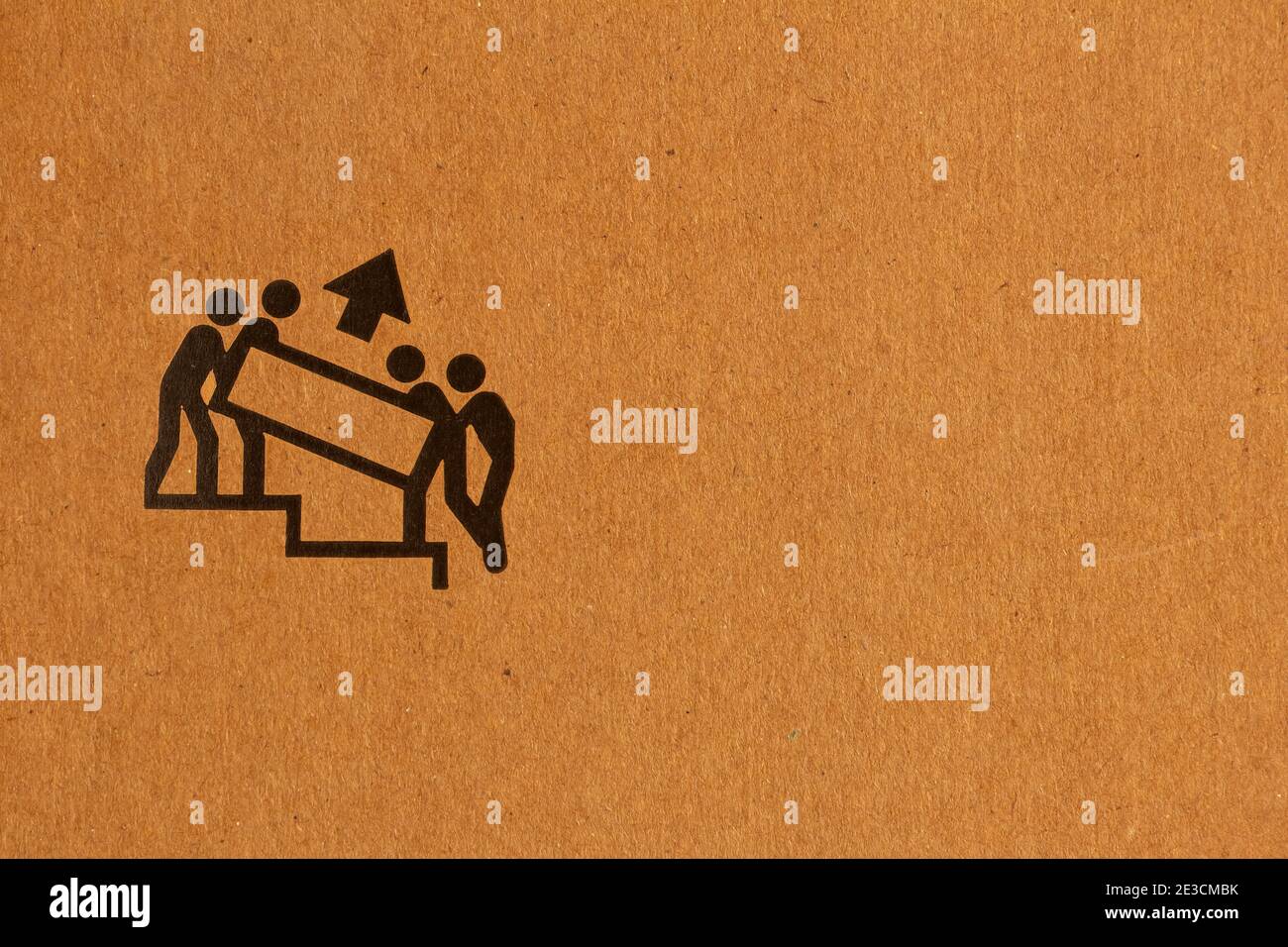 Simbolo di imballaggio per indicare quale lato è rivolto verso l'alto ed è necessario più persone da sollevare Foto Stock