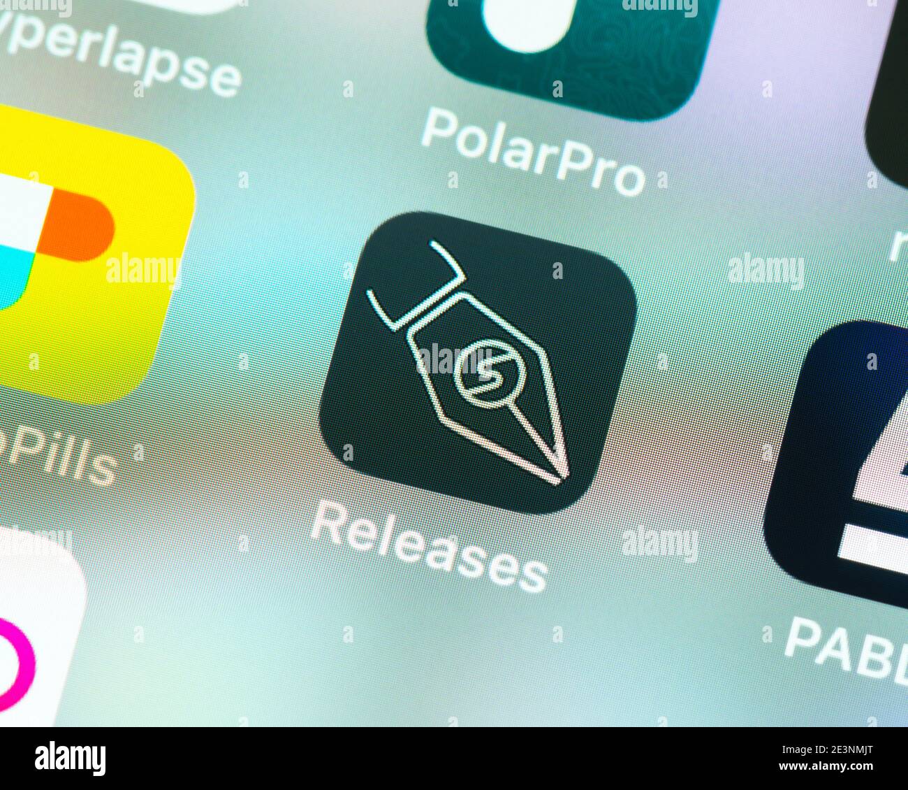 Rilascia l'icona dell'app sulla schermata di Apple iPhone. Release è un modello e un'applicazione di rilascio delle proprietà di Snapwire. Foto Stock