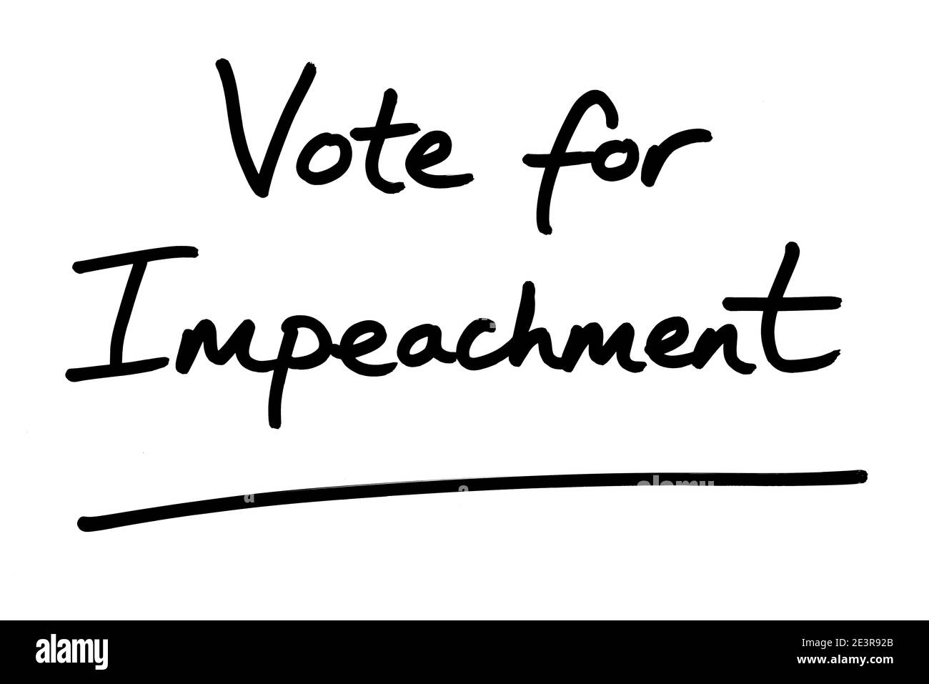 Votare per l'impeachment, scritto a mano su sfondo bianco. Foto Stock