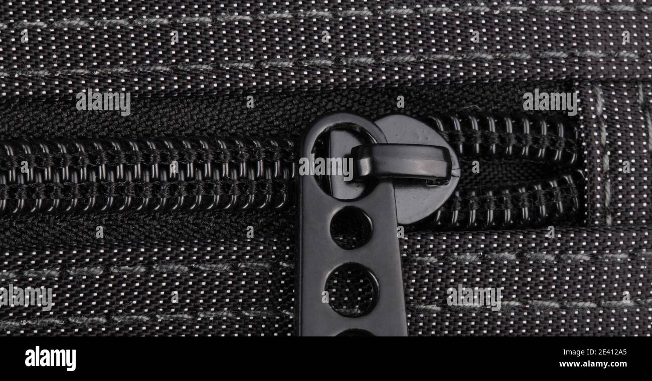 Borsa nera con puntini bianchi Foto Stock