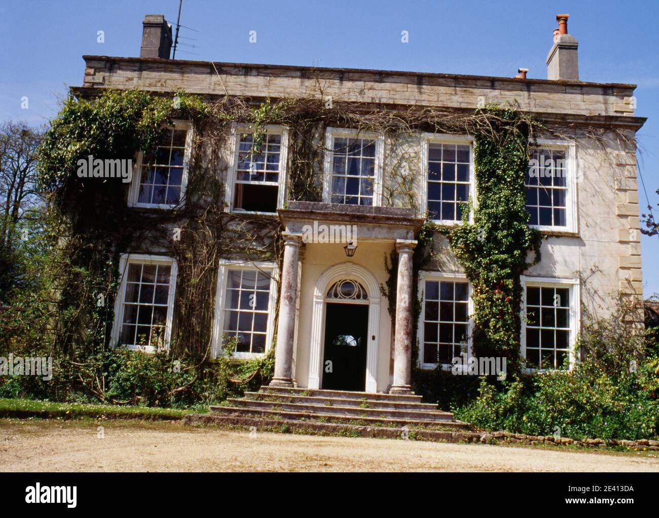 Tardo georgiano casa coperta con superriduttore, beaminister dorset Foto Stock